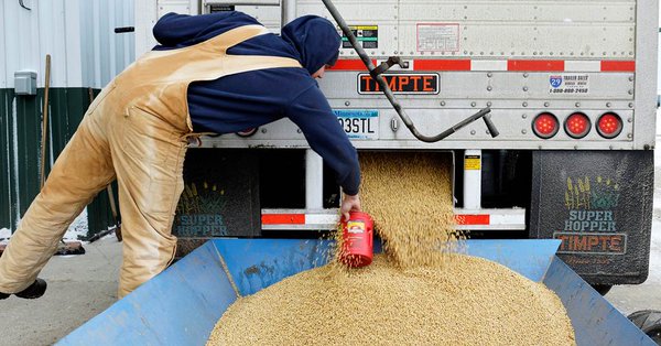 China retaliates, slaps duties on U.S. soybeans, planes; markets skid