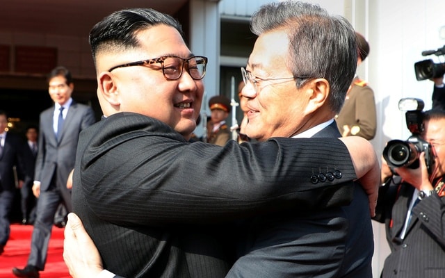 Leaders of two Koreas hold surprise meeting as Trump revives hopes of summit with North