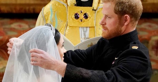 Watch The Moment Prince Harry Appears To Whisper ‘You Look Amazing’ At Meghan Markle