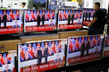 Trump offers to end Korea war games after historic Kim summit
