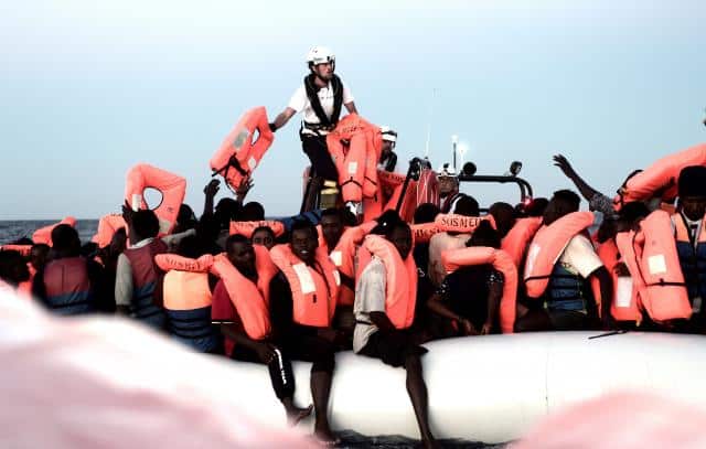 Spain offers to dock migrant ship at heart of Italy-Malta standoff