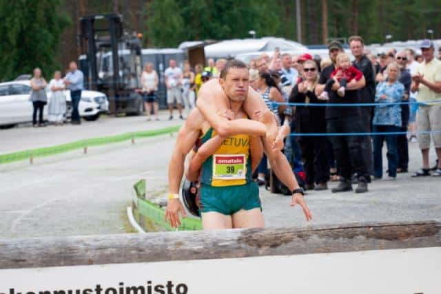 Lithuanian couple win world wife-carrying championship title in Finland