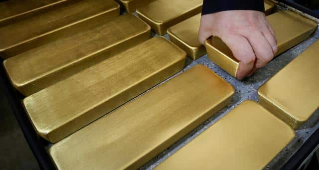 Gold Reaches Seven-Month High As Stocks, Dollar Struggle