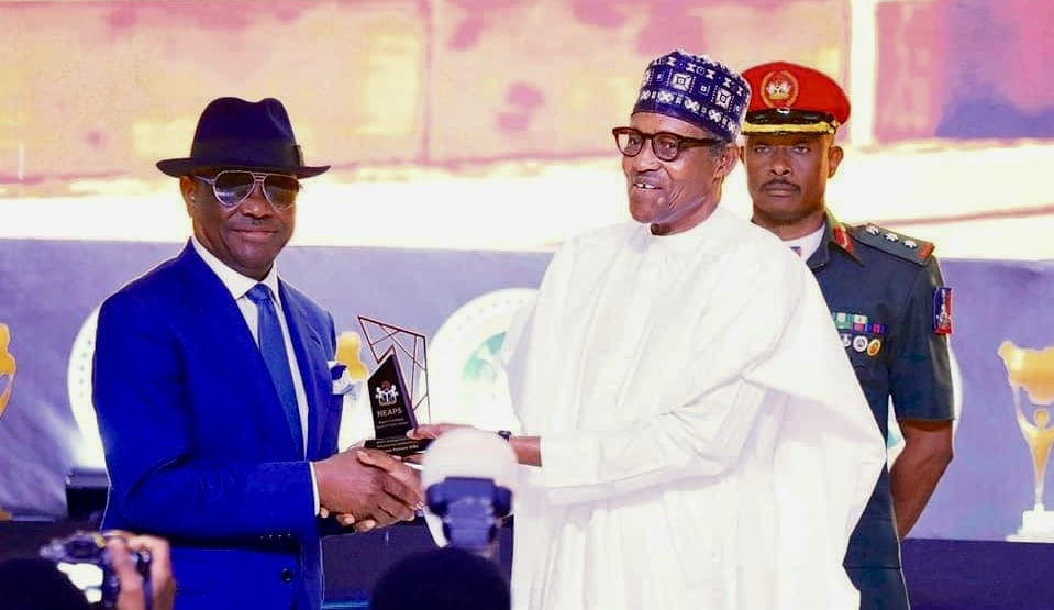 Buhari Transcends Partisan Divide, Confers Wike with Excellence Award in Public Service